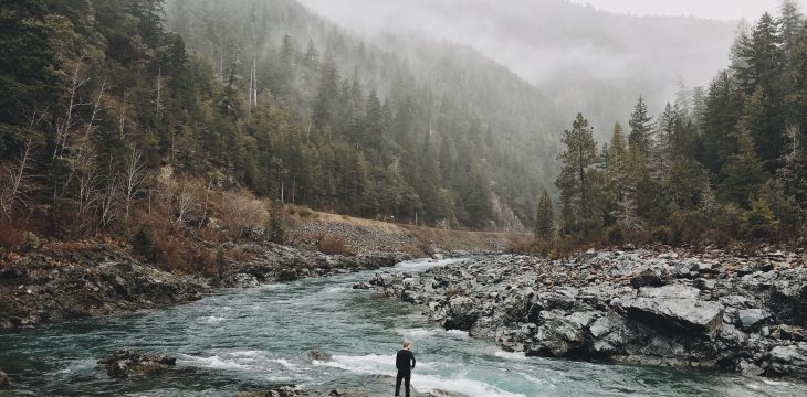 standing near a river